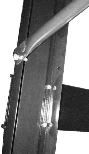 Nut (15) Leg (3) Carriage Bolt (14) Brace (4) Figure C a. Press the flat side of the Brace against the outside of the Legs. b.