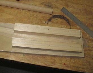 Check out Ken s jig for drilling holes in the side of a dowel.