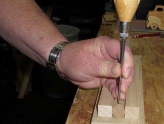 Step 3: Carefully measure and mark the location of the center of the hole to be drilled.