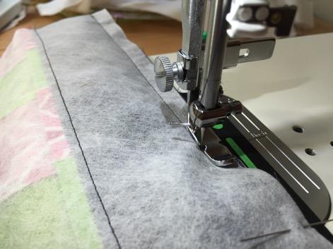 You are now ready to sew the top edge to the zipper. Sew the zipper seam, using the zipper as a guide and a zipper foot.
