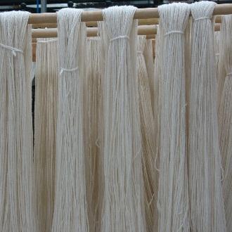 Woollen spun yarns will continue to soften and felt slightly over time whereas worsted spun yarn is remains closer to the state when it was first made, gradually wearing thinner and sometimes harder.