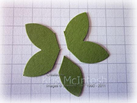 Cut into the centre of the flower and then cut out two sets of two petals and one single petal.
