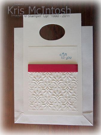 Attach the stamped piece to the envelope, making sure that it is a little