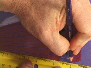 Use the violet pencil to make a mark almost as small as you can make