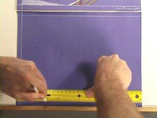 Now lay your ruler across the marks and draw a border line