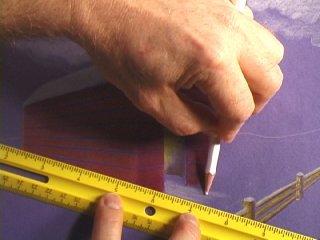 Slide the ruler up to the door keeping the same angle and use the side