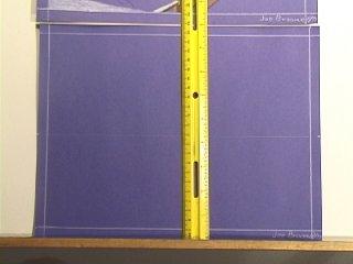 Lay your ruler with the centimeter side of the ruler vertically near
