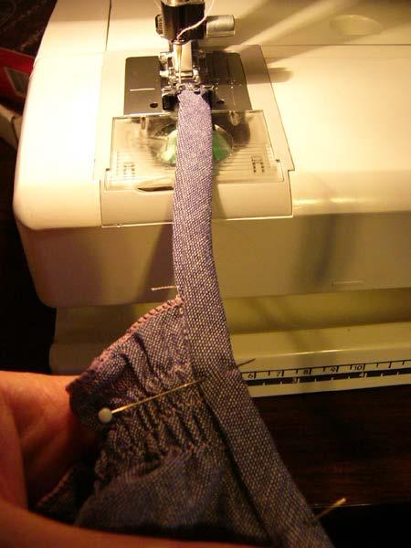 13. Using the edge of your pressure foot as a guide, from the right side, top stitch along the edge of the tie, starting at one end, then following the line