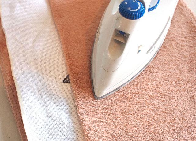 After washing, iron your project between two towels with low heat and steam.