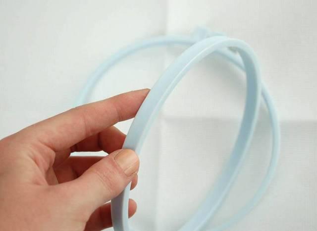 The hoop has a special lip to grip the fabric extra tight.