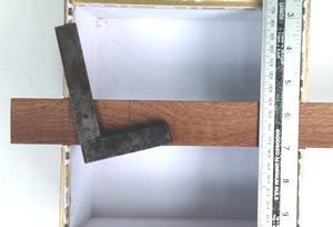 5. Place the neck into the openings in the box with the 40mm protruding from the end.