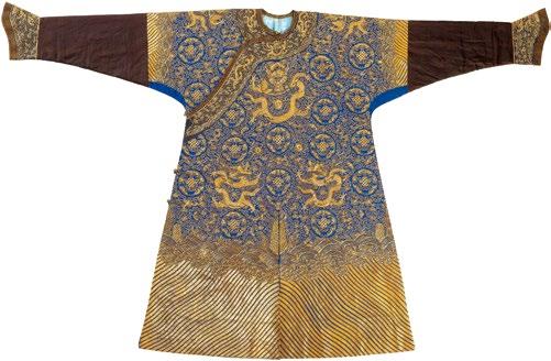 2.5 Semi-formal court robe of blue silk with dragons and roundels composed of bats, endless knots, and peaches Chamber 4 This elaborate Qing court robe features nine five-clawed dragons amongst