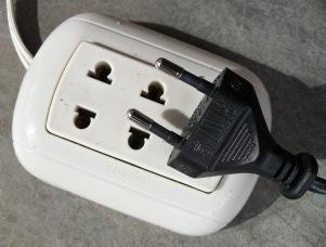 Many Peruvian electrical outlets are designed to accept both types (see image below).