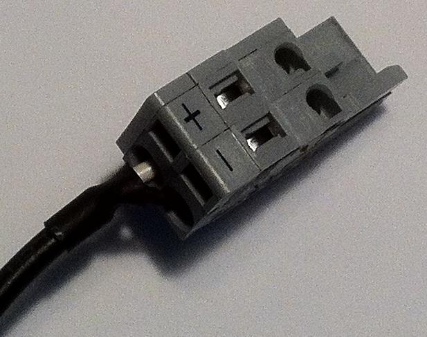 to insert a wire. A properly-wired power connector is shown: The RLX2 radios accept power from 802.