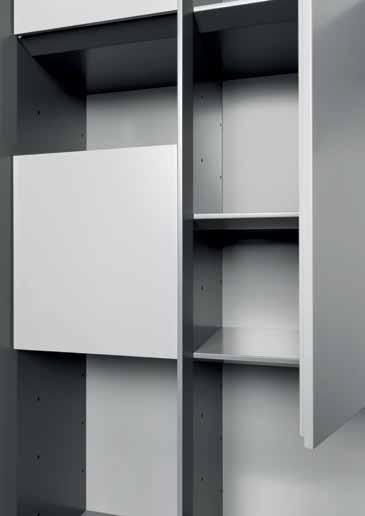 9 cm Module inserts with own body and own front are mounted between the shelving walls. They are available with hinged doors, drawers, flaps and lift flaps. At 46.