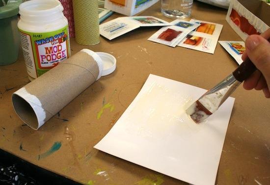 Add Mod Podge to the backs of all of the papers.