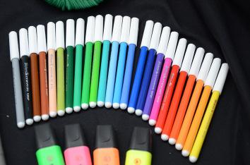 A set of 24 different colored felt-tip pens.