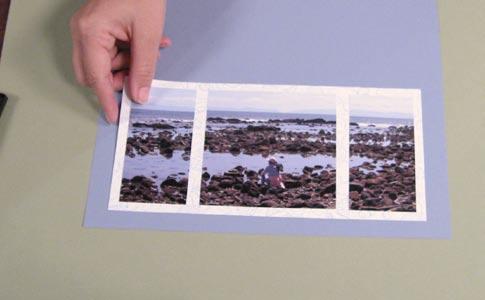 page between the matted panoramic photo and the photos above it.