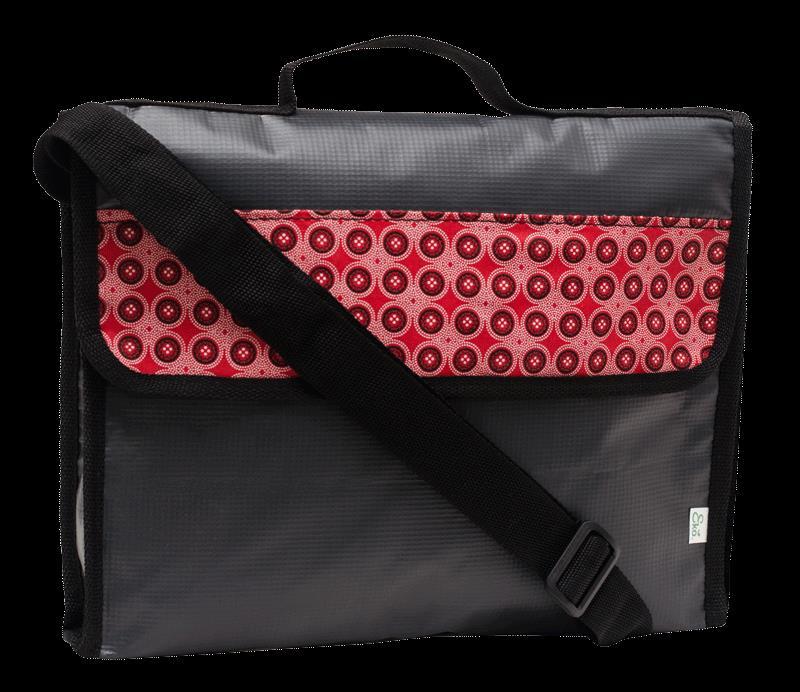 BLACK PVC WITH SHWESHWE BUDGET CONFERENCE BAG (PVCB03) Made from the reverse side of waste PVC Billboards which are black. Assorted coloured shweshwe trim is used.
