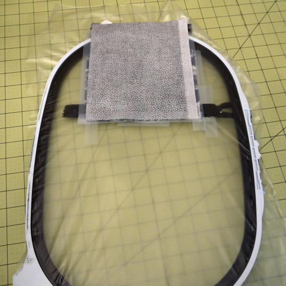 6) Replace the hoop on your machine, making sure the lining fabric stays in the correct