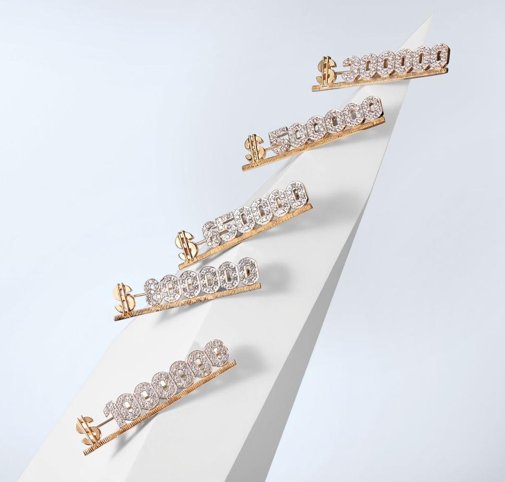 Circle of Achievement $300,000 $600,000 Diamond Bar Pins 14-karat yellow and white gold pins;.