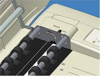 Push down on the two lever buttons found near the insertion slot on each side of the scanning area lid. 3.