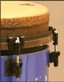 1) Removing the old drumhead Start by using the tuning key (See Figure MT.