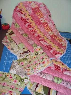 (If so, I would put the knots to the side you think you will use less.) 8. Repeat this with all five pieces. Don't worry about batting in the layer that goes around the quilt back.