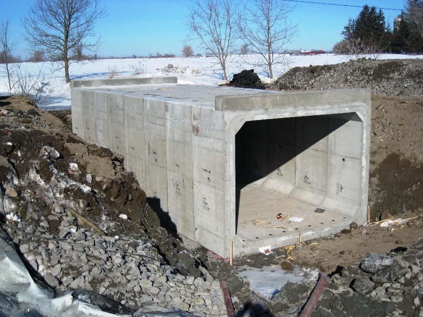Fig. 17: Culvert with Precast Header Walls If the header wall is smaller in size, and not limited by mass or design, the header wall can be cast onto the box unit in a secondary pour while at the