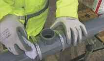 Position saddle immediately, ensuring that spigot locates in hole in pipe wall.
