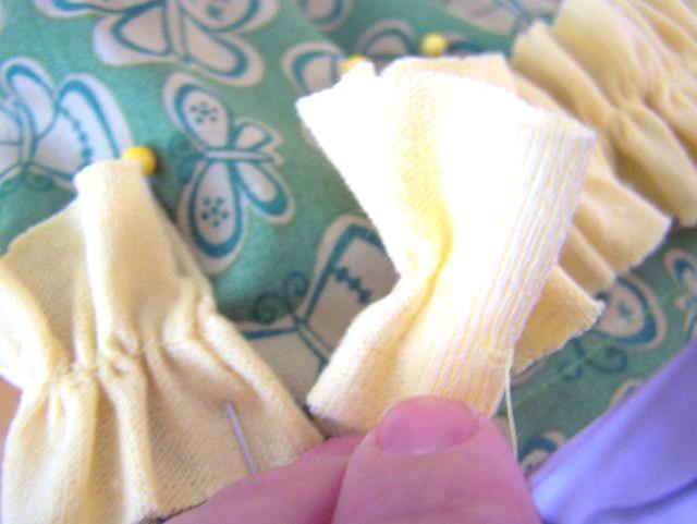 5. Turn ends of ruffle strip under ¼ before pinning down.