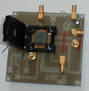 Figure 4.28. Photograph of the packaged OP2 (PLCC 44 pin package) and the PCB During wafer based measurements, the biggest limitation was in making high frequency measurements.