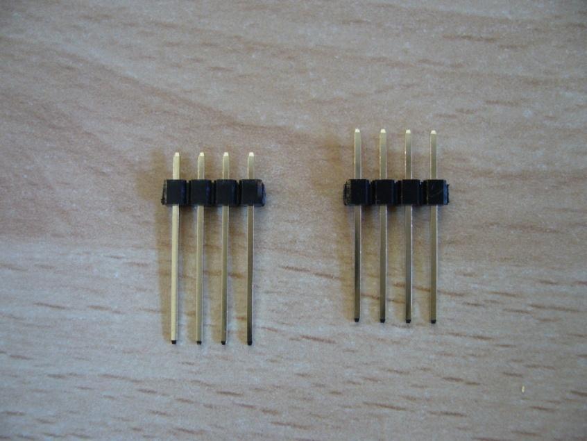 Option 2. Pin strips are inserted in a socket formed with a set of pins and strips on the AGC board.