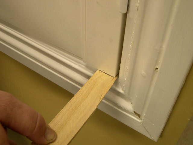 12. Remove the hinge pin to separate the hinge and place onto window jam in reference to the mark made on step 11.