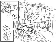 42 Connection and finishing work, applies to all Take the two attaching clamps (1) from the kit. Use them to secure the cable from the engine block heater at the servo line pipe (2).