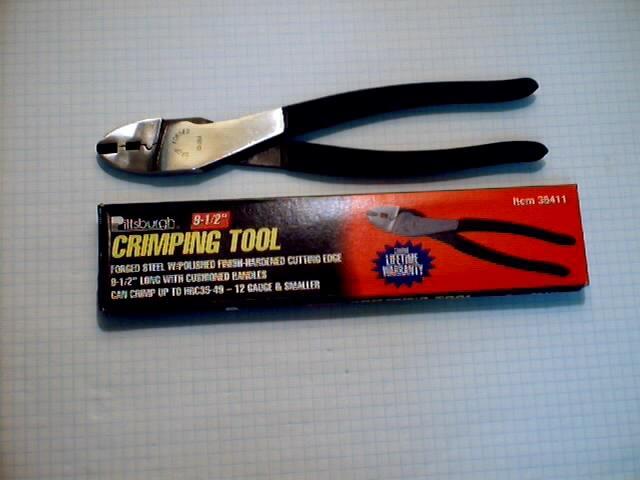 This will help to prevent flattening of the contact when it is crimped. See Figure 3 Figure 3 Crimping Tool.