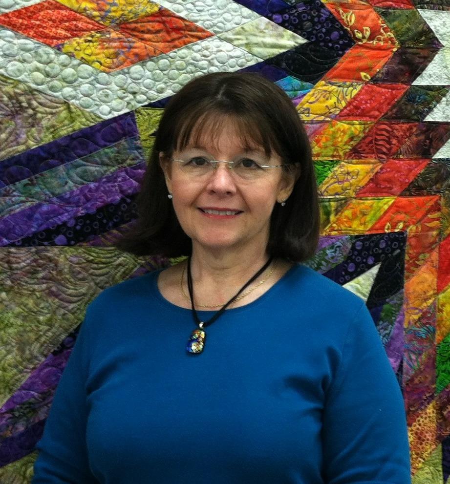 She feels honored to have photographs of her quilting published in books as well as national and international magazines. Mary Beth is a national educator for the Handi Quilter company.
