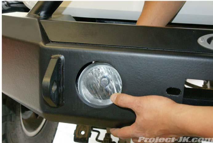 DRILL OUT THE (4) MOUNTING HOLES ON EACH OF YOUR JEEP S FOGLIGHTS USING A