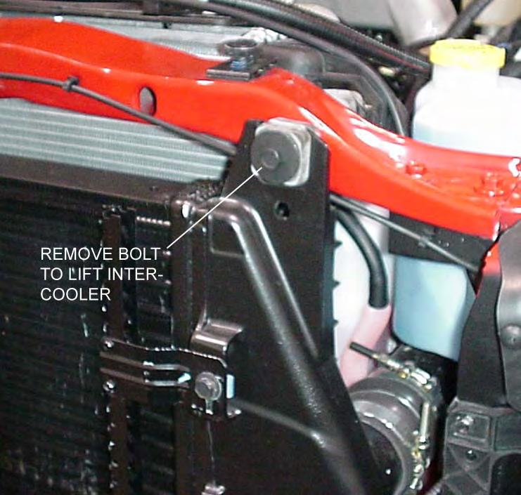 3. Remove bumper with brackets. Unplug the factory fog lamps if so equipped. Support the bumper then remove the paired bolts attaching the bumper brackets to the frame.