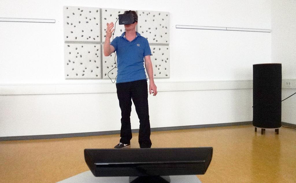 (a) (b) Figure 2: (a) Photo of a tourist in front of a Microsoft Kinect sensor. (b) The tourist's virtual view on the HMD. 2 version of NUI Group's Community Core Vision (CCV).