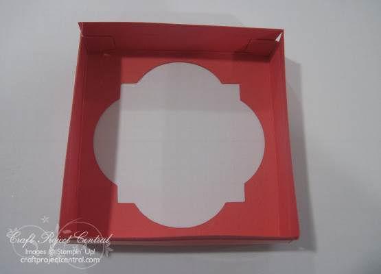 Remove the Sticky Strip from the small corner tabs and adhere it inside the adjoining side to form the box shape (Step 4b).