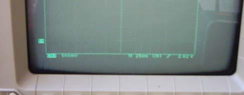 The zero voltage position is indicated by the square green marker on the left hand vertical (Y) axis. Waveform from a PCWI DC15 unit set at 5.0 kv. Peak voltage ~5.4 kv.