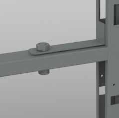 Install two (2) bolts through the securing plates on the Stacking Frame. Do not tighten. 4.