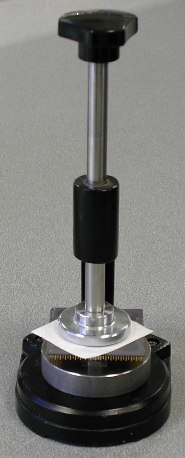 Procedure 1. Calibrate the MultiPrep System according to the procedures in the manual. 2. Place the parallel polishing fixture that was used for calibration onto the hot plate and heat to 175 C. 3.