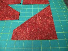 Trim ¼ from short side of pocket and pin to right edge. 15.