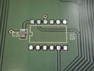 Remove the solder from the PCB using either a solder vacuum or solder braid making sure to clean the area