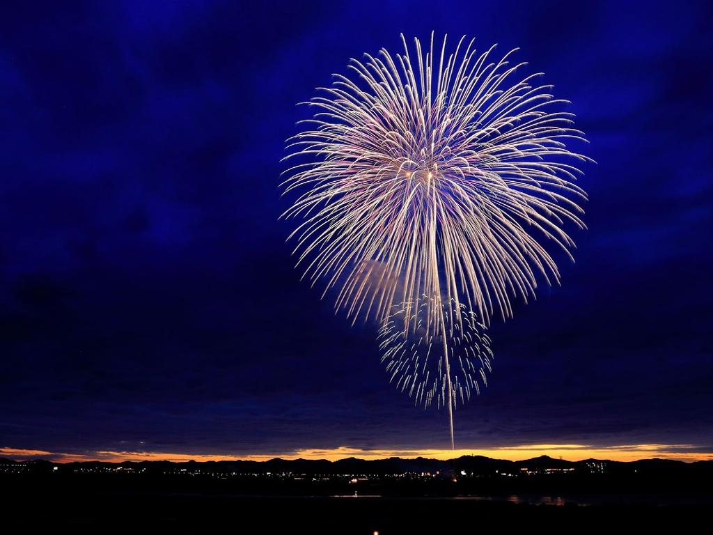 In this one single image, both moving light sources and non-light sources are captured. Fireworks are light sources and produce light streaks. Can you see the clouds?