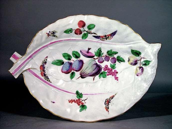 A First Period Worcester Porcelain Large Leaf Dish, Circa 1770. This moulded overlapping leaf dish was possibly decorated by the famous London painter, James Giles.