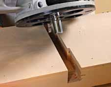 To make that happen, the dog holes in the benchtop slant 2 toward the vise; in the vise, they lean toward the benchtop. Cut angled dadoes.