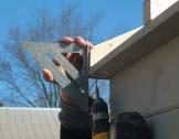 12 Square up overhang board for rear of shed & install 12.